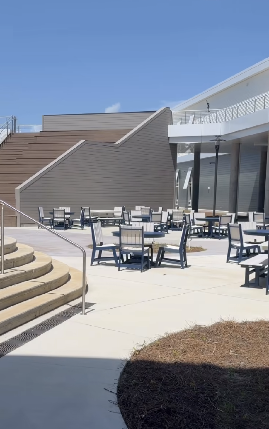 Outdoor courtyard seating at Gulf Shores High School.
